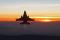 An F-16 from the Combined Test Force at Edwards AFB, California, goes vertical in afterburner.