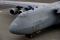 A C-5M Super Galaxy crew taxis to a parking spot after going through a celebratory spray-down at Dover AFB, Delaware. Lt. Gen. Brooks L. Bash, Air Mobility Command vice commander, served as the delivery official for Dover's last assigned C-5M. 