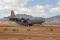 A USAF C-130 Hercules, with the 700th AS, Georgia Air Force Reserve Command, lands at Hubbard landing zone at Fort Huachuca, Arizona, on 18 June 2014.  Aircrew members from the 700 AS participated in a two-week course hosted by the Advanced Airlift Tactical Training Center attached to the 139th Airlift Wing, Missouri Air National Guard.  