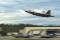 An F-22 Raptor from the 525th FS takes off from the Joint Base Elmendorf-Richardson, Alaska, during a training mission on 6 August 2014.