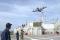 A Portuguese P-3 Orion aircraft conducts a fly-by over of the Military Sealift Command joint high-speed vessel USNS Spearhead (JHSV 1) in January 2015. Spearhead is on a scheduled deployment to the US 6th Fleet area of responsibility to support the international collaborative capacity-building program Africa Partnership Station.